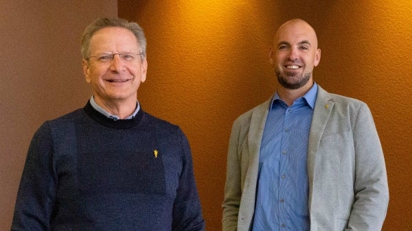 Michael Hool and Brent Sebold standing side by side.