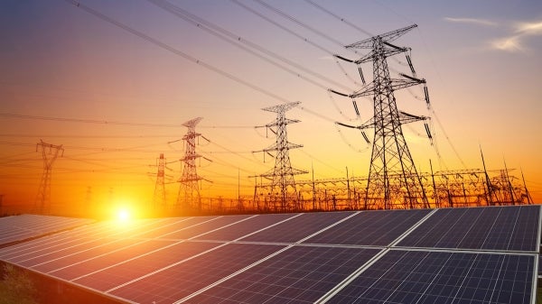 solar panels below electrical power lines