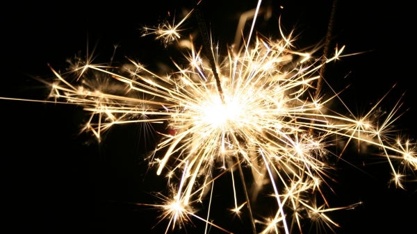 A sparkler surrounded by darkness.