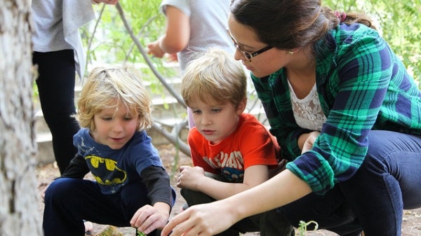 ASU Teachers College student engaging with preschool students