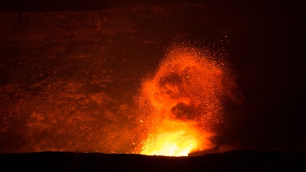 A volcano erupts.