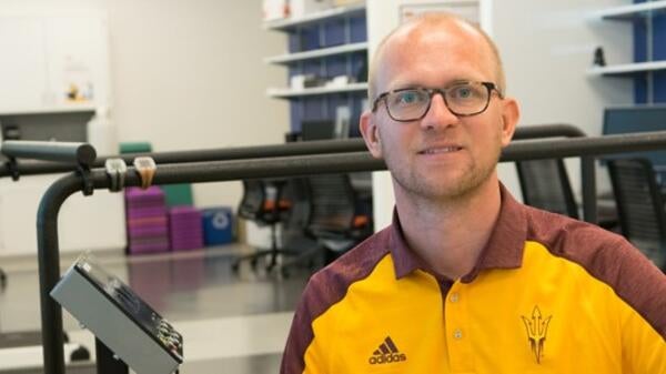 College of Health Solutions assistant professor Floris Wardenaar in lab