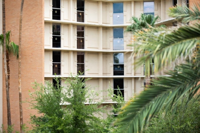 exterior of ASU building in which students have affixed decals that read, "Hearts of Gold" to their windows