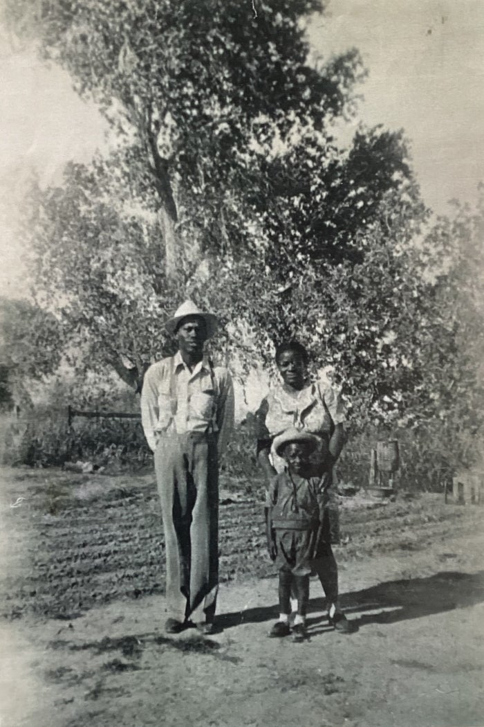 Three members of an Okemah family pose in a historic photo