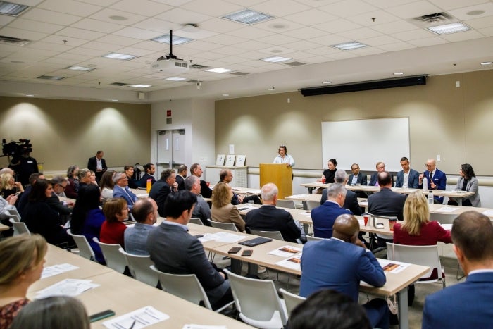 Panel talking to group of people