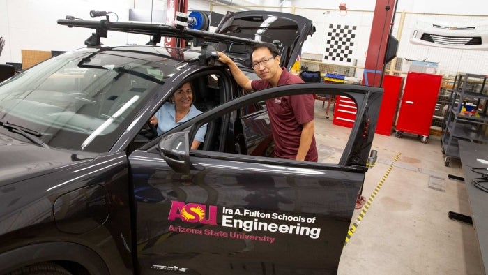 Norma Hubele and Jungfeng Zhao at Polytech automotive facility