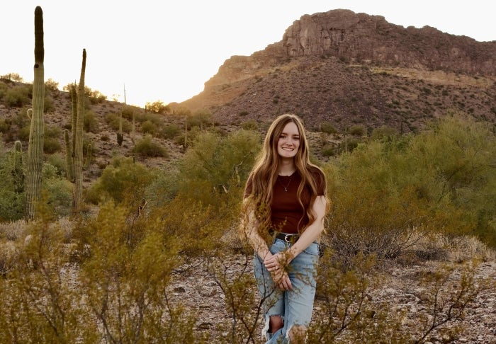 Photo of Gracie Thompson in the desert