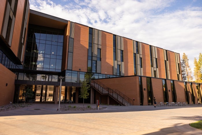 Exterior of new brick and glass building on a college campus