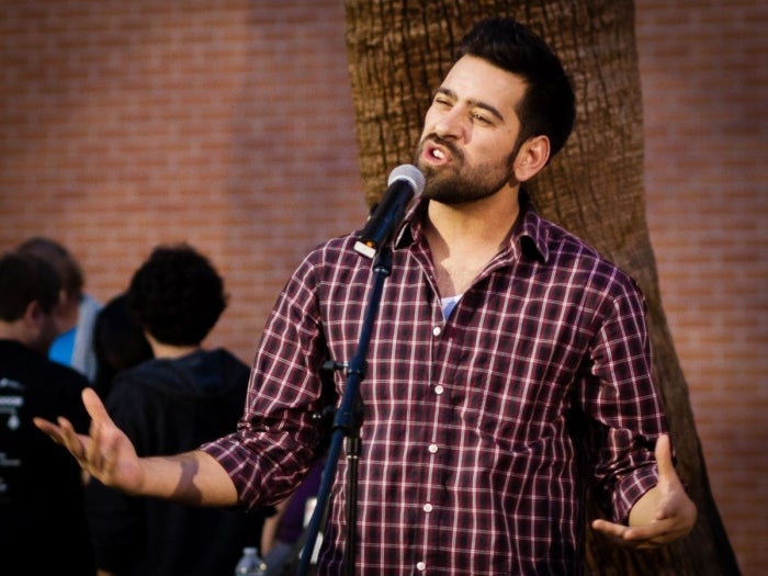 Image of Slam poet Myrlin Hepworth at ASU Night of the Open Door in 2013, photo by Bruce Matsunaga