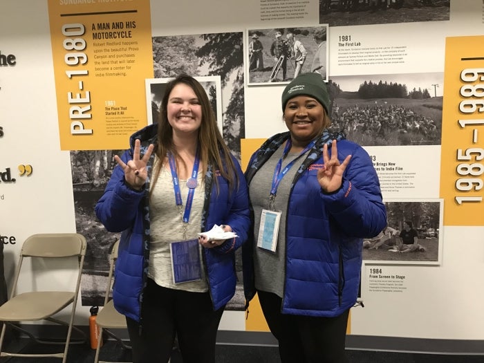 Left to right: 2018 ASU Sundance interns Madison Schaffer and Destiny Liley show their Sun Devil loyalty while dressed for Park City winter weather. Photo courtesy Kevin Sandler.