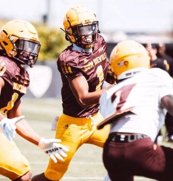 Sun Devil football players playing in a practice game