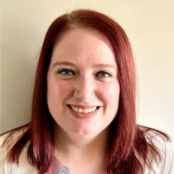 Portrait of woman with medium-length red hair