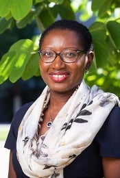 Portrait of woman wearing glasses and scarf