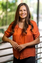 Laura Smalarz leaning on a railing