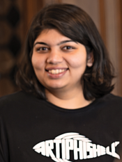 Portrait of a young woman wearing a black t-shirt with dark chin-length hair