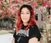 Woman with red hair smiling