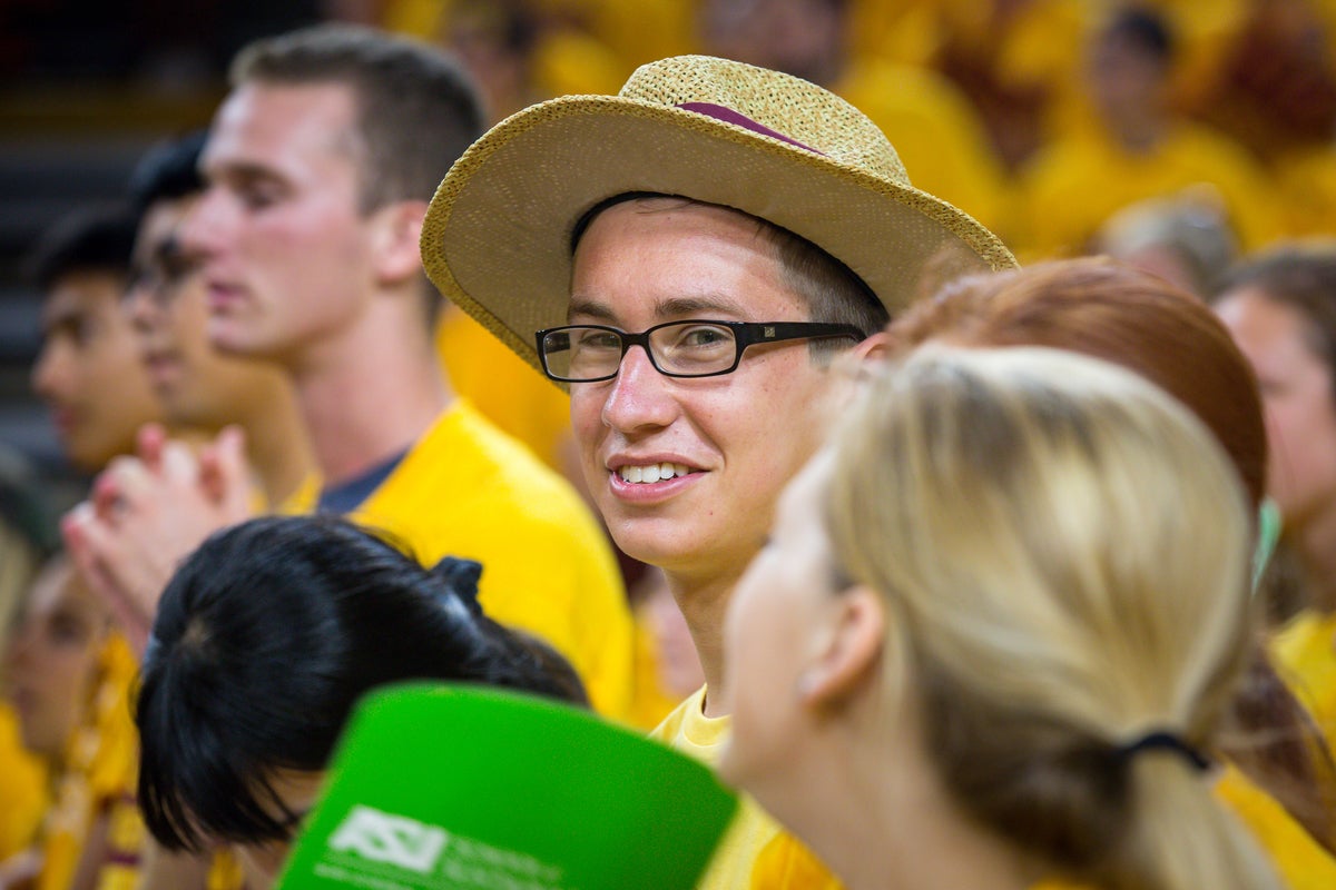 Student in a crowd.