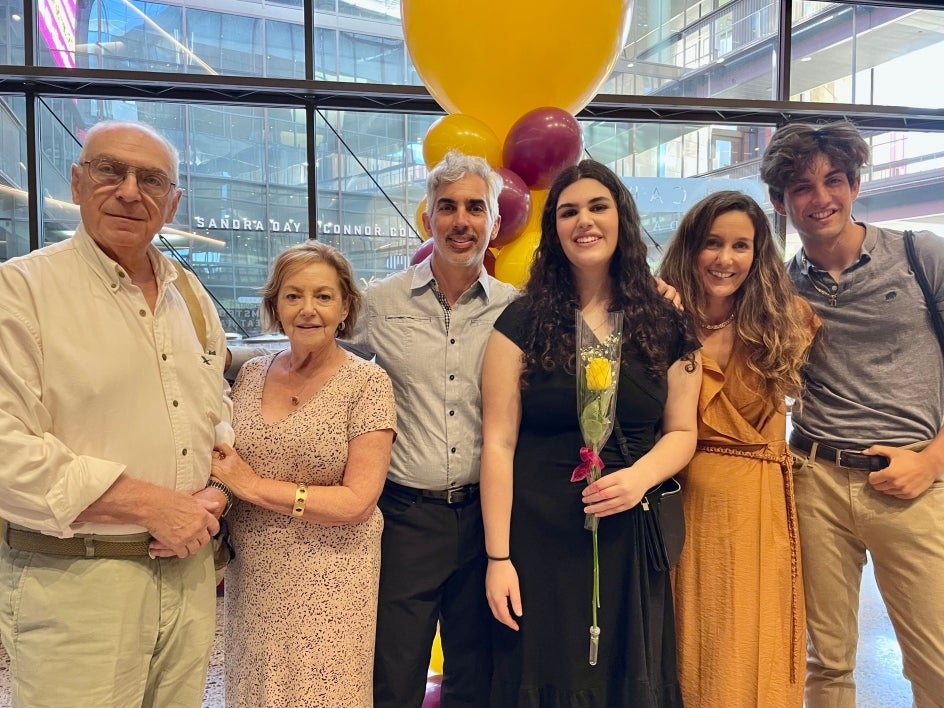 ASU BSN graduate Elliana Tenenbaum posing for a group photo with members of her family.