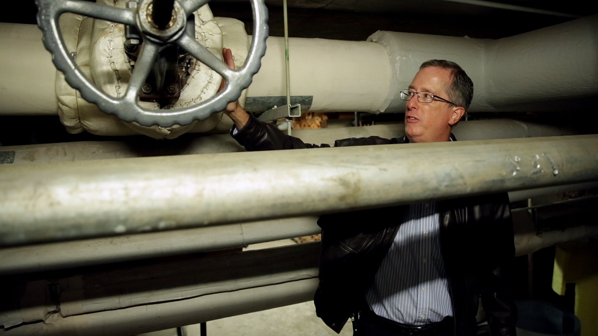 Guy hanging out with his friends, the pipes.