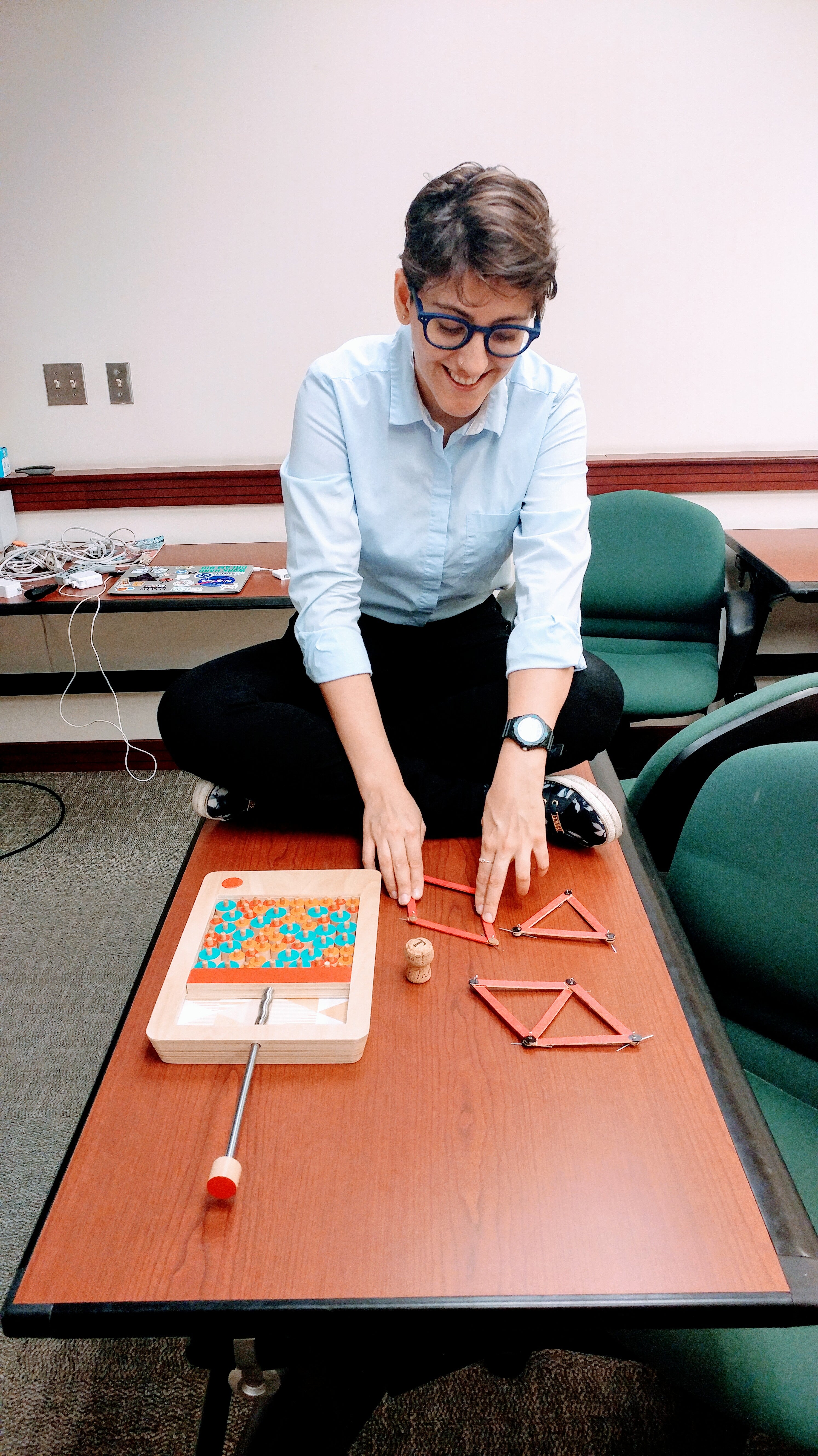 varda at a table with puzzle on it