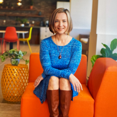 Portrait of woman sitting on a chair