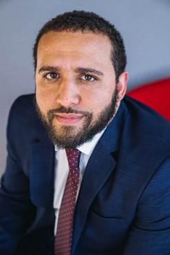 Man in blue suit and tie