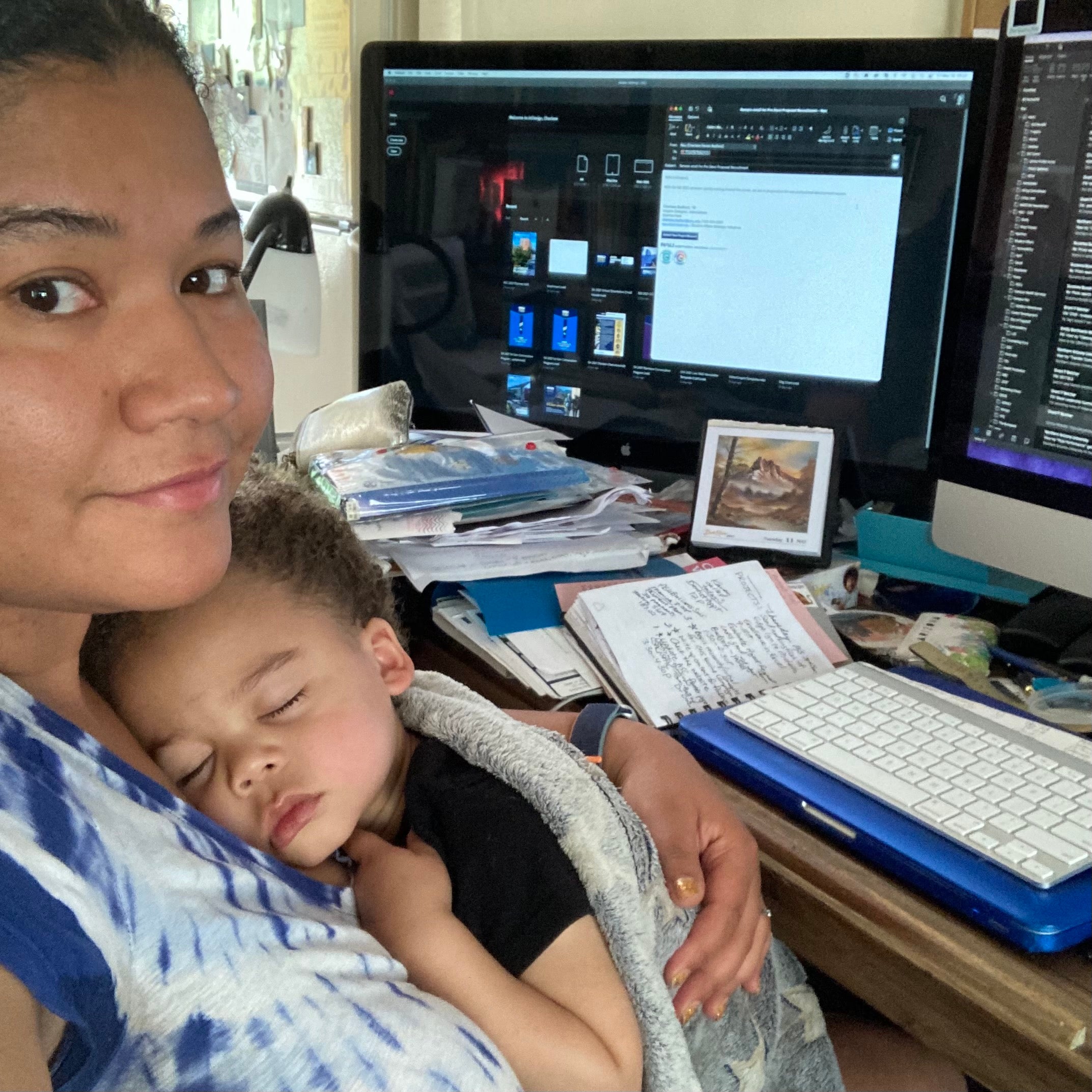 Charlese and her son working from home